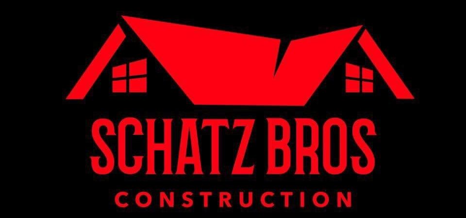 A red and black logo for the schatz brothers construction.